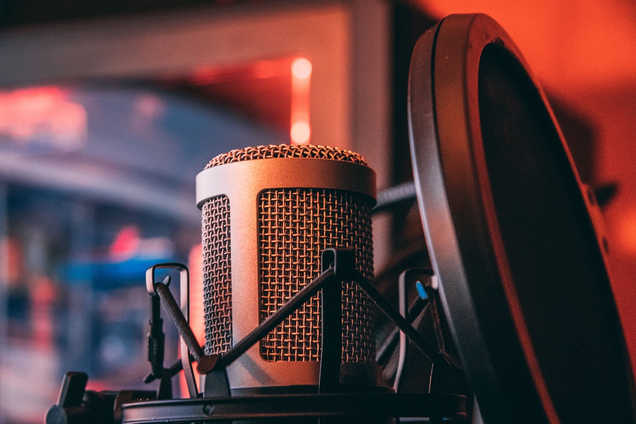 Cartoon illustration of voice actor recording in studio
