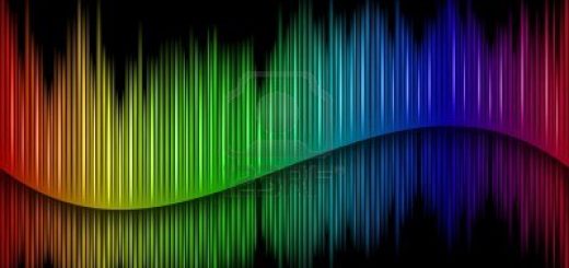A rainbow-colored sound wave made of vertical lines against a black background.