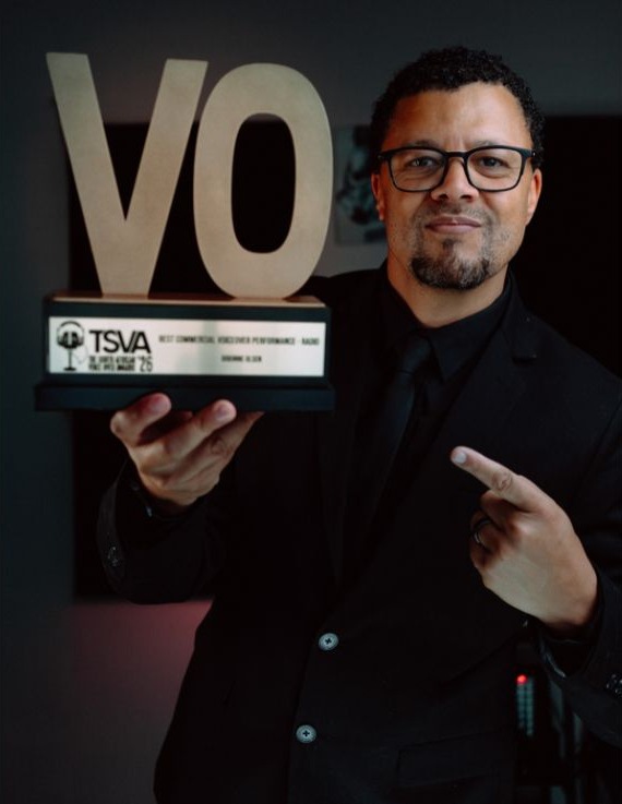 Image: 5FM. Brionne Olsen, station voice of 5FM, holding his South African Voiceover Award for Best Commercial Voiceover Performance, Radio