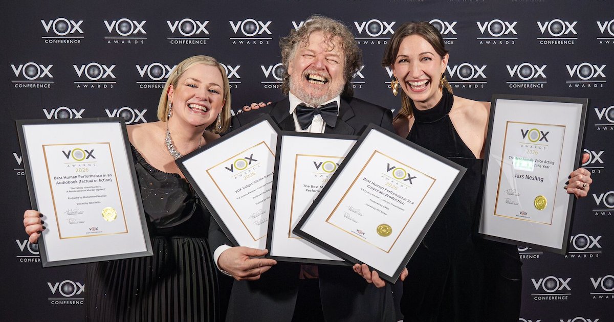 Image: VOX Events Ltd, photo by Jo Robbens Photography. From left, Nikki Mills, Phil Rowe and Jess Nesling laughing on the VOX Awards 2026 red carpet, holding their framed award certificates
